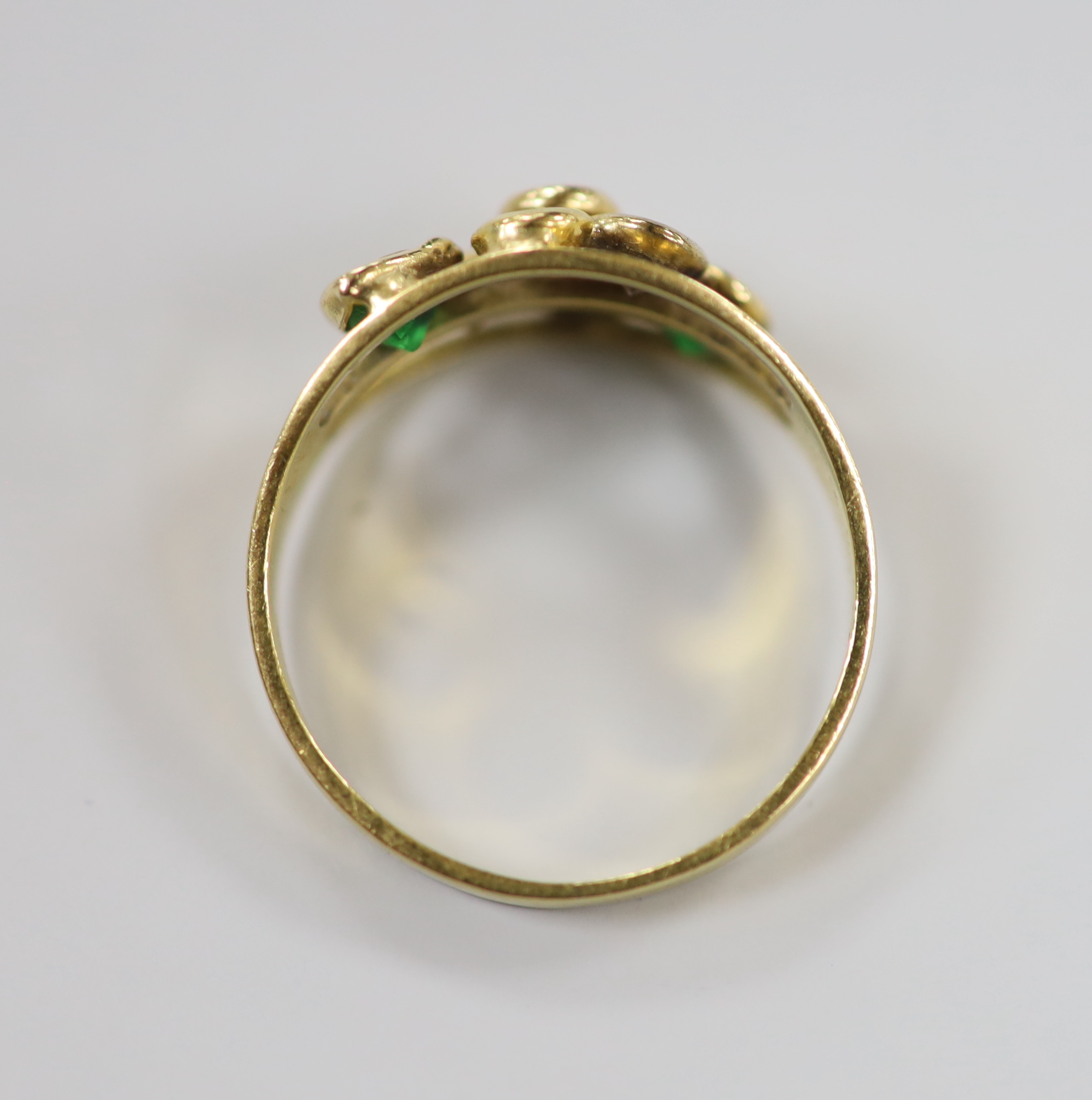 A modern Italian 750 yellow metal and seven stone multi gem collet set ring, size O, gross weight 2.8 grams.